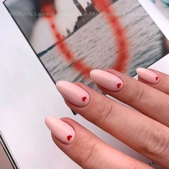 Valentine’s Day nail designs you’re sure to love! Choosing designs for holidays is always so much fun, and the ideas are endless! This list has 15 nail designs that are perfect for Valentine’s Day. #nails #inspiration #valentinesday #valentinesnails #holidaynails #naildesigns #nailinspo #holidays #love